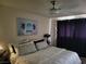 Main bedroom with a queen bed and calming decor at 4537 Buena Vista Dr, Las Vegas, NV 89102