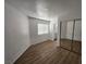 Bedroom featuring a mirrored closet and blinds at 4610 Cannon Beach St, Las Vegas, NV 89122