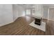 Cozy living room featuring wood-look floors, fireplace, and ample natural light at 4610 Cannon Beach St, Las Vegas, NV 89122