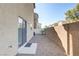 Small, gravel backyard with block wall at 4793 Cannon Hill Ct, Las Vegas, NV 89130