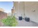 Landscaped backyard with gravel and central AC units at 4793 Cannon Hill Ct, Las Vegas, NV 89130