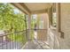 Private balcony overlooking trees and neighborhood at 4793 Cannon Hill Ct, Las Vegas, NV 89130