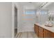 Double vanity bathroom with tub and walk-in closet at 4793 Cannon Hill Ct, Las Vegas, NV 89130