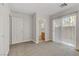 Bedroom with sliding glass door to backyard at 4793 Cannon Hill Ct, Las Vegas, NV 89130