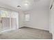 Spacious bedroom with sliding door to patio and carpet flooring at 4793 Cannon Hill Ct, Las Vegas, NV 89130