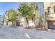 Three-story townhome with attached garage and front yard at 4793 Cannon Hill Ct, Las Vegas, NV 89130