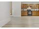 View of kitchen with light wood cabinets and granite countertops at 4793 Cannon Hill Ct, Las Vegas, NV 89130