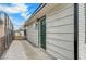 Backyard with gravel pathway leading to detached storage shed at 6520 Evergreen Ave, Las Vegas, NV 89107