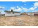 Back of house, showing patio and yard at 6520 Evergreen Ave, Las Vegas, NV 89107