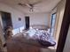 Spacious bedroom with large bed and sliding door access at 671 Bourbon St # H2, Pahrump, NV 89048