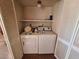 Laundry room complete with washer and dryer hookups at 671 Bourbon St # H2, Pahrump, NV 89048