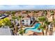 Community overview featuring multiple buildings, pool, and distant city views at 700 Carnegie St # 4812, Henderson, NV 89052