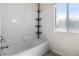 Clean bathroom with a bathtub and a shower caddy at 700 Carnegie St # 4812, Henderson, NV 89052