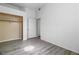 Spacious bedroom with wood-look floors and a closet at 700 Carnegie St # 4812, Henderson, NV 89052