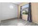 Bedroom with wood-look floors and a large window at 700 Carnegie St # 4812, Henderson, NV 89052