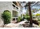 Side view of the building showing a walkway and landscaping at 700 Carnegie St # 4812, Henderson, NV 89052