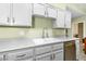 Modern kitchen with stainless steel appliances and light gray cabinets at 700 Carnegie St # 4812, Henderson, NV 89052