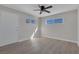 Bright and airy bedroom with new flooring, fresh paint, and plenty of natural light at 704 Berry Cir, Las Vegas, NV 89107