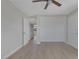 Well-lit bedroom with ceiling fan, and neutral wall color at 704 Berry Cir, Las Vegas, NV 89107