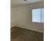 Simple bedroom with a window and carpet at 7155 Steele Canyon St, Las Vegas, NV 89118