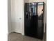 Black refrigerator with ice and water dispenser at 7155 Steele Canyon St, Las Vegas, NV 89118