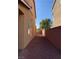 Side yard with gravel and block wall, providing privacy at 7155 Steele Canyon St, Las Vegas, NV 89118