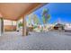 Covered patio with built-in grill, fireplace, and grassy area at 752 Golden Sedum Dr, Henderson, NV 89011