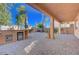 Spacious backyard with covered patio and outdoor kitchen at 752 Golden Sedum Dr, Henderson, NV 89011