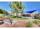 Community park with playground, shaded seating, and walking paths at 752 Golden Sedum Dr, Henderson, NV 89011