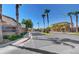 Summit Ridge community entrance with palm trees and landscaping at 752 Golden Sedum Dr, Henderson, NV 89011