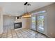 Dining area with tile floors, chandelier, and views of the kitchen and living room at 752 Golden Sedum Dr, Henderson, NV 89011