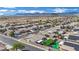 An aerial view showcasing the community with mountain views in the distance at 7912 Rushmore Ave, Las Vegas, NV 89131