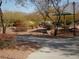 Tranquil park featuring walking paths, picnic areas, mature trees, and colorful foliage, perfect for relaxation at 7912 Rushmore Ave, Las Vegas, NV 89131