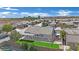 Aerial view of the home featuring a large yard, patio, and well-maintained landscaping at 7912 Rushmore Ave, Las Vegas, NV 89131