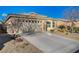 Charming single story home with a two car garage and desert landscaping at 7992 Barntucket Ave, Las Vegas, NV 89147