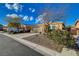 Charming single story home with a two car garage and desert landscaping at 7992 Barntucket Ave, Las Vegas, NV 89147