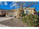 Charming single story home with a two car garage and desert landscaping at 7992 Barntucket Ave, Las Vegas, NV 89147