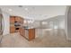 Open kitchen featuring stainless steel appliances, granite countertops, and a large island with pendant lighting at 7992 Barntucket Ave, Las Vegas, NV 89147