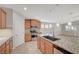 Kitchen with stainless steel appliances, granite countertops, and pendant lighting over the island at 7992 Barntucket Ave, Las Vegas, NV 89147