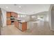 Open kitchen featuring stainless steel appliances, granite countertops, and a large island with pendant lighting at 7992 Barntucket Ave, Las Vegas, NV 89147