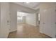 Open living room space with tile floors, neutral walls and lots of natural light at 7992 Barntucket Ave, Las Vegas, NV 89147