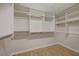 Spacious walk-in closet with custom shelving and drawers, offering ample storage space at 7992 Barntucket Ave, Las Vegas, NV 89147