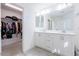 Bathroom with double vanity and walk-in closet at 8125 Monsoon Bay St, Las Vegas, NV 89113