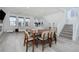 Bright dining area with hardwood floors and modern light fixtures at 8125 Monsoon Bay St, Las Vegas, NV 89113