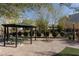 Community dog park with covered seating and benches at 8125 Monsoon Bay St, Las Vegas, NV 89113