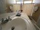 Bathroom vanity with double sinks, neutral wall coloring, and a large mirror at 8203 Heather Rock Ct, Las Vegas, NV 89117