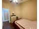 Bedroom featuring a ceiling fan, a dresser, and an abundance of natural light at 8203 Heather Rock Ct, Las Vegas, NV 89117