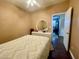 Bedroom featuring a bed with decorative linens, dresser with mirror, and view of the doorway at 8203 Heather Rock Ct, Las Vegas, NV 89117