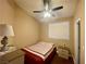 Bedroom featuring a ceiling fan, and an abundance of natural light through the window at 8203 Heather Rock Ct, Las Vegas, NV 89117