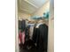 Walk-in closet with ample hanging space for clothes and plenty of room for storage at 8203 Heather Rock Ct, Las Vegas, NV 89117